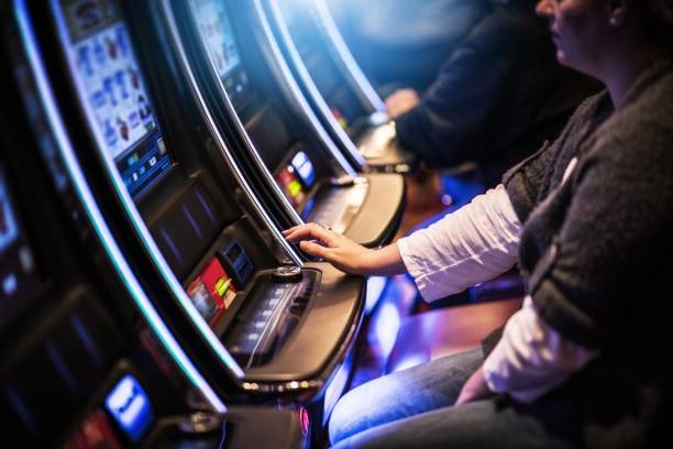 Live dealer streaming Egypt's Book of Mystery on mobile phone screen